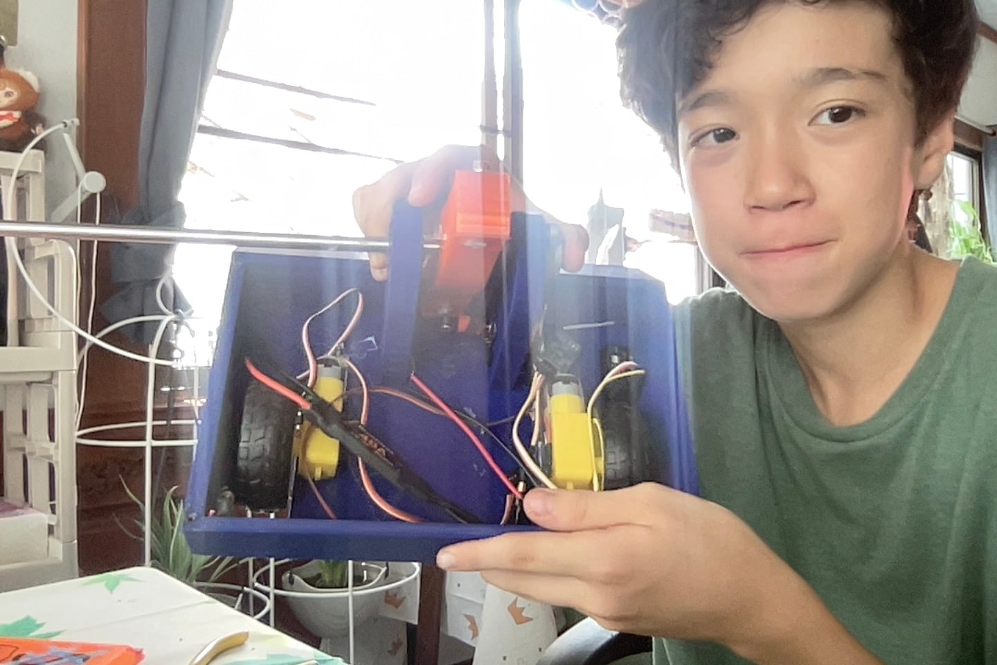 Miles showing the inside of the Strikeout battle bot