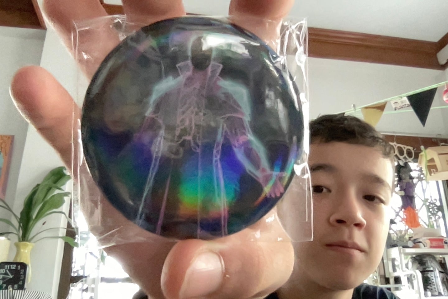 Miles holding a sumo robot part